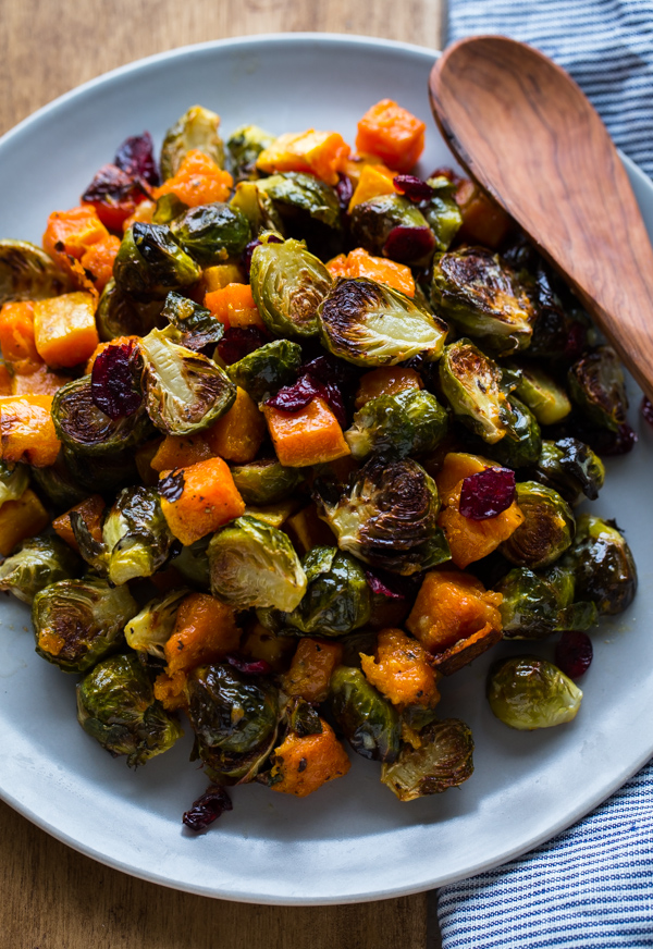 roasted-brussels-sprouts-and-squash-with-dried-cranberries-and-dijon-vinaigrette_abeautifulplate