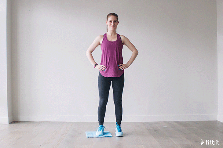 Woman doing towel slides for towel workout