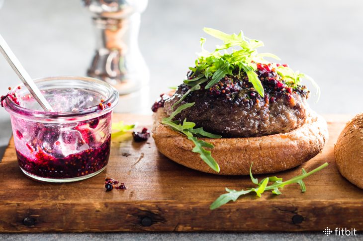 Healthy recipe for bison burgers with blackberries and arugula