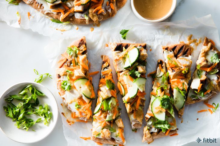 Healthy recipe for naan pizza with grilled chicken and spicy peanut sauce