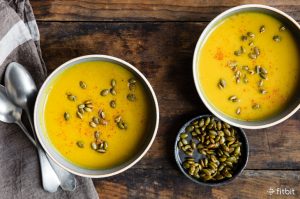 Healthy recipe for curried butternut squash soup with spiced pepitas