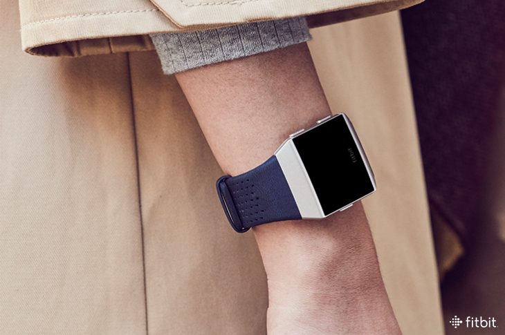 Woman wearing Fitbit Ionic's Horween leather band