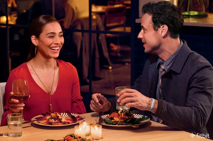 man and woman eating together, social dining