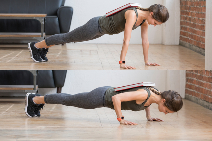 Place a book on your back for a bit of added resistance in push-ups.