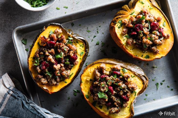 Healthy recipe for stuffed acorn squash with turkey sausage and cranberries