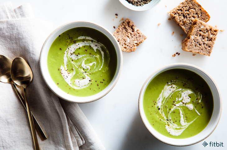 Healthy green soup recipe with cashew cream swirl