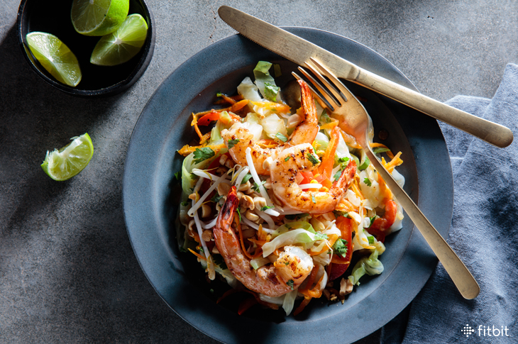 Healthy recipe for cabbage pad thai with grilled shrimp
