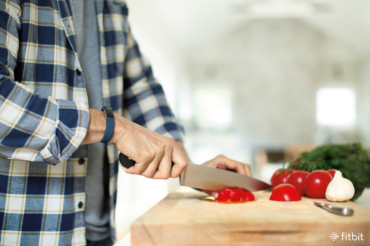 Man cutting foods that may cause an upset stomach